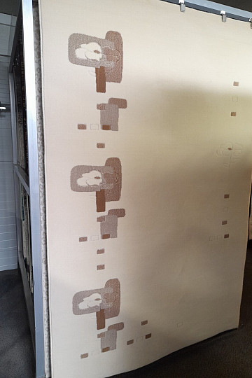 Svijetlo bež vuneni tepih