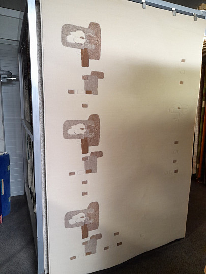 Svijetlo bež vuneni tepih